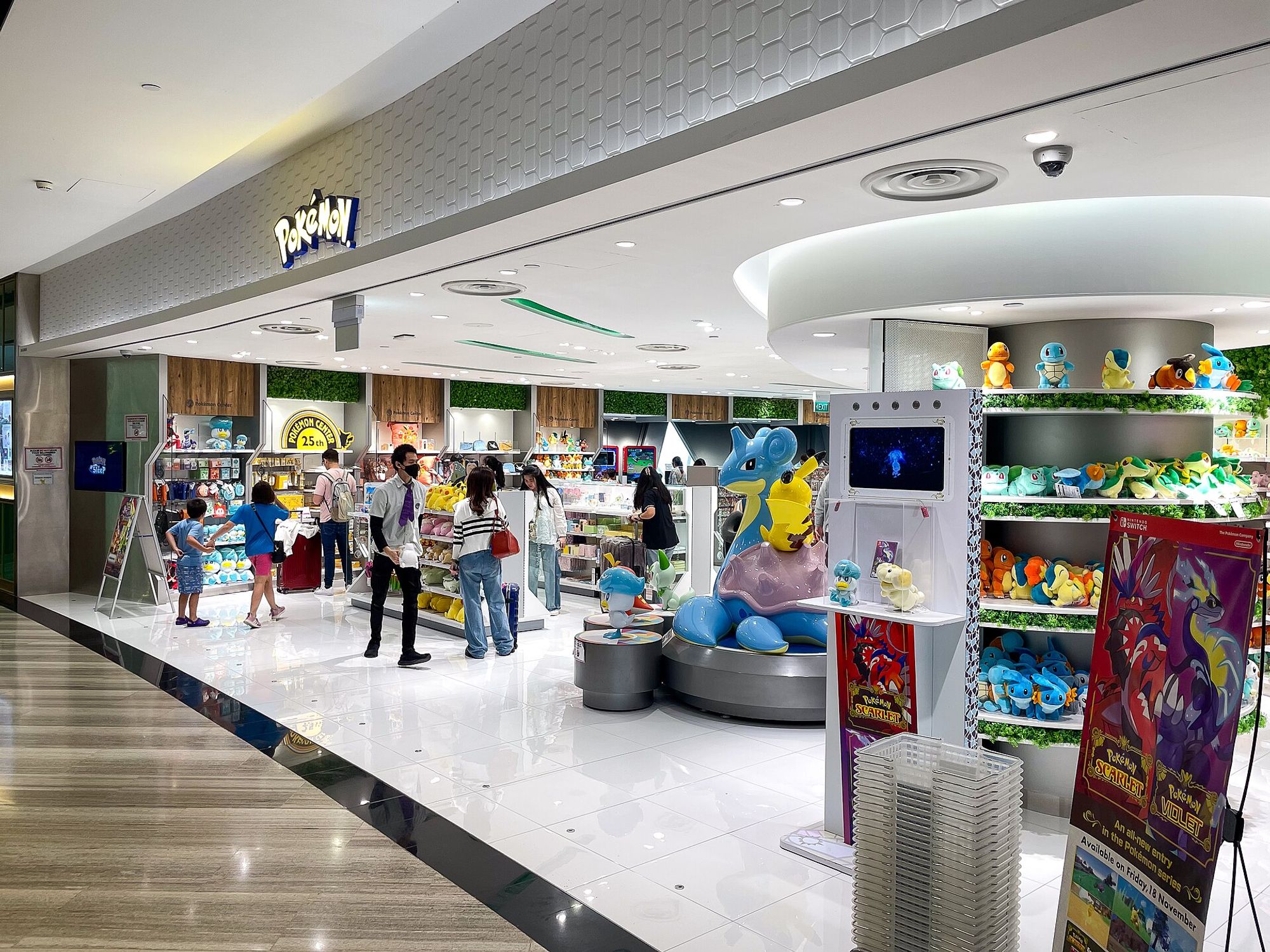 Pokémon Center Singapore in Jewel Changi Airport, with a life-size Lapras and Pikachu at the entrance.