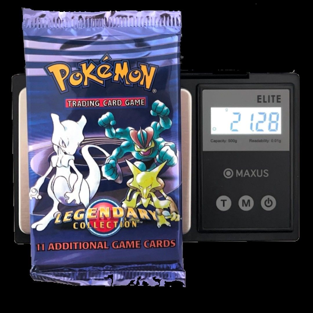 A Legendary Collection pack on a scale reading 21.28 g.