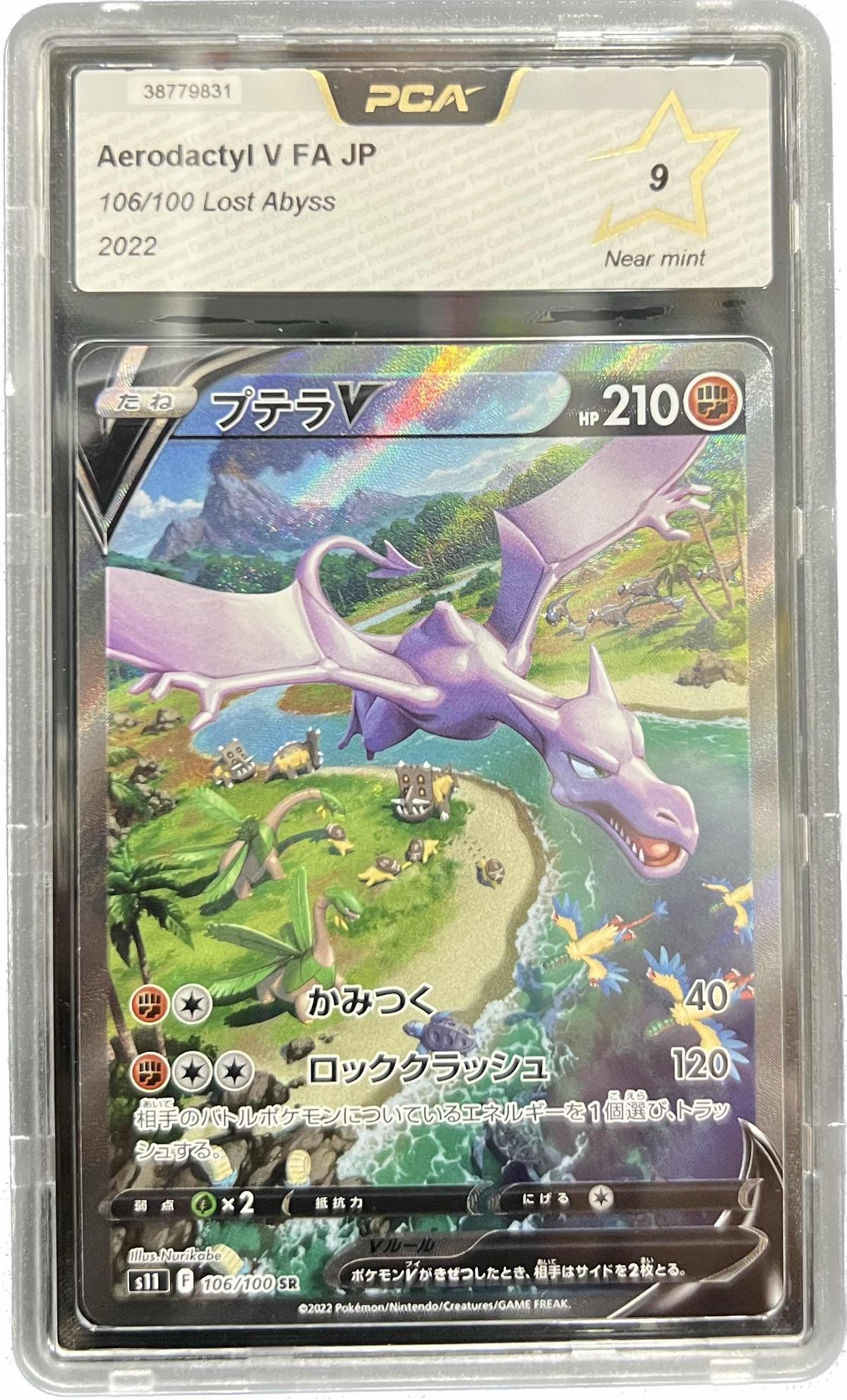 A PCA slab holding a Japanese Aerodactyl V full art graded 9, Near mint, with the gold star on the label.